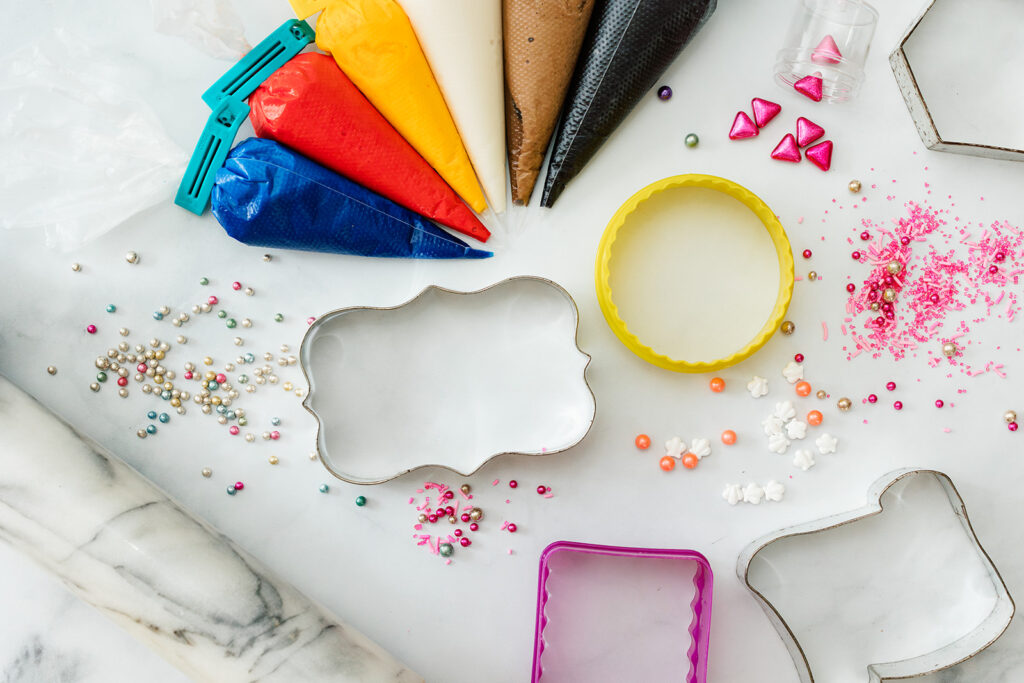 Cookie cutters, piping bags and sprinkles on a white table in Kitchener-Waterloo Ontario